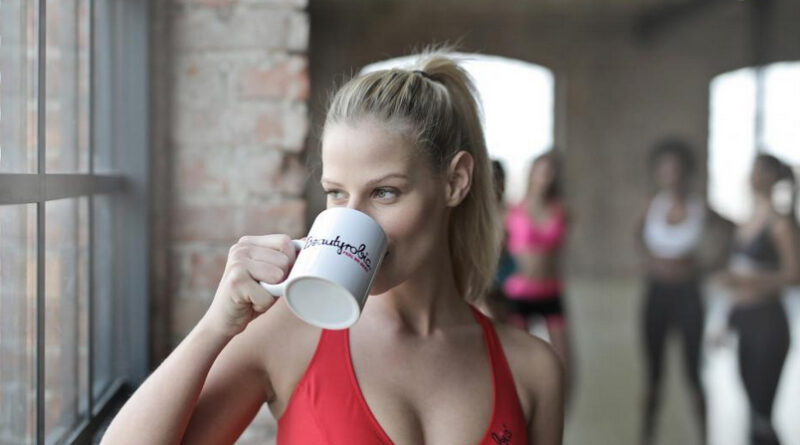 Fit Healthy Lady Drinking Coffee - coffeebeantree.com